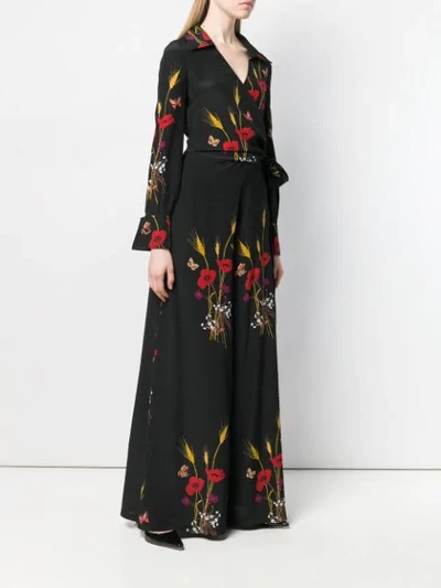 Shop Valentino Floral Print Jumpsuit In Black