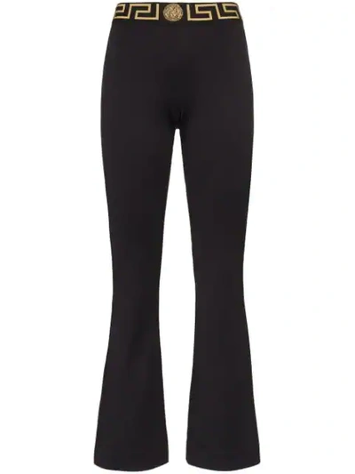 Shop Versace Logo-waist Track Trousers In Black