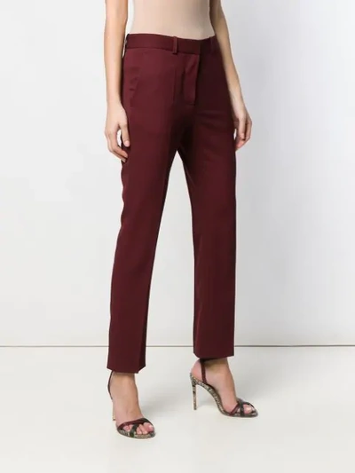 Shop Victoria Beckham Cropped Trousers In Red
