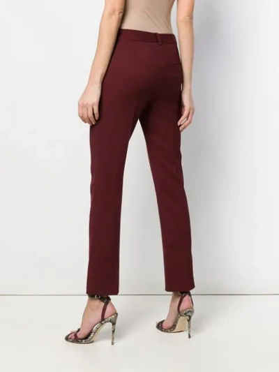 Shop Victoria Beckham Cropped Trousers In Red