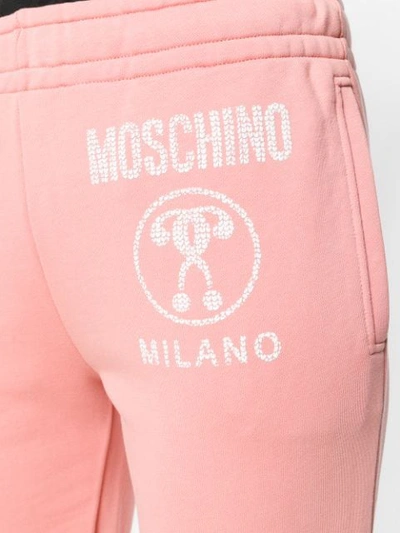 Shop Moschino Logo Track Trousers In Pink