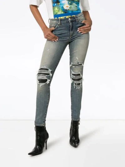 Shop Amiri Mid-rise Ripped Skinny Jeans In Blue