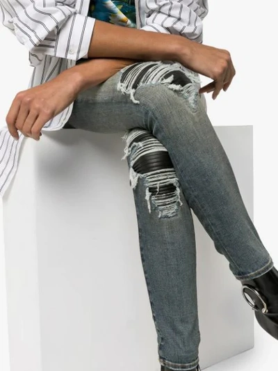 Shop Amiri Mid-rise Ripped Skinny Jeans In Blue