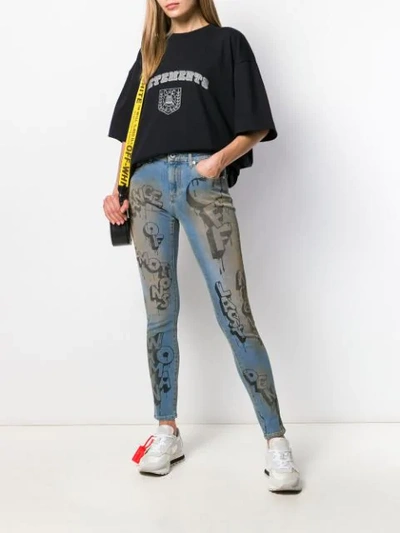 Shop Off-white Graffiti Print Skinny Jeans In Blue