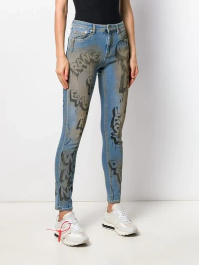 Shop Off-white Graffiti Print Skinny Jeans In Blue