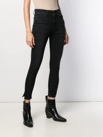 Shop Levi's Fringed Hem Skinny Jeans In Black