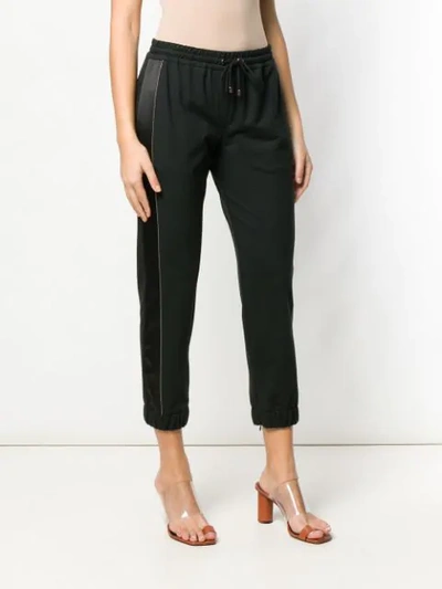 Shop Brunello Cucinelli Crop Length Track Trousers In Black