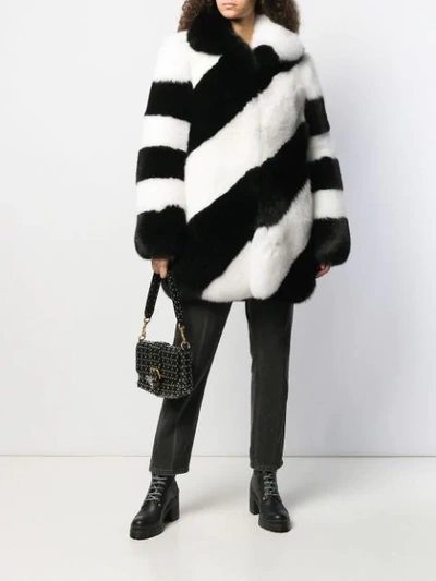 Shop Saint Laurent Fur Diagonal Striped Coat In Black