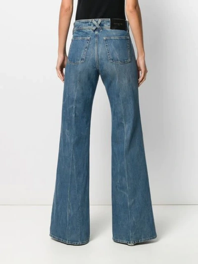 Shop Givenchy Flared Jeans In Blue