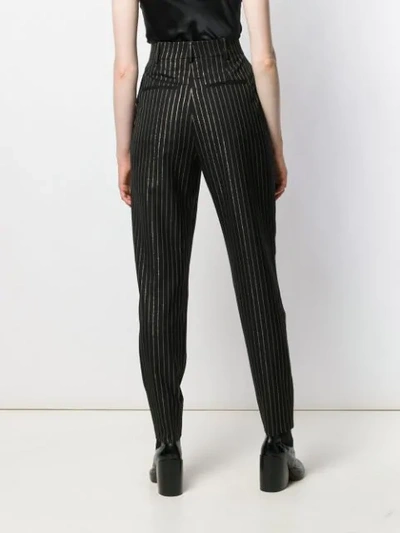 Shop Saint Laurent High-waisted Metallic Stripe Trousers In Black