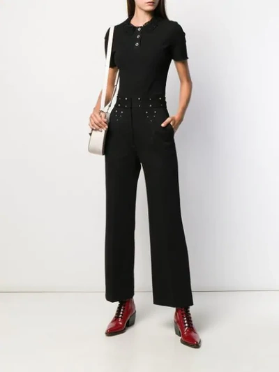 Shop Sandro Flared Trousers In Black