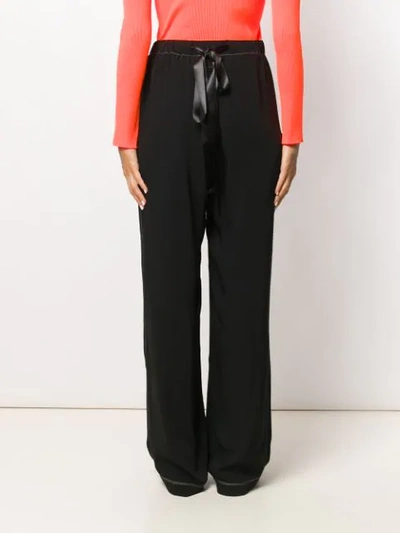 Shop Mm6 Maison Margiela Contrast Stitching Trousers In Black