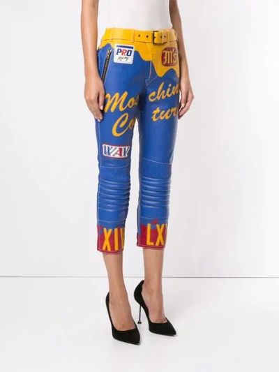 Shop Moschino Leather-effect Cropped Biker Trousers In Blue