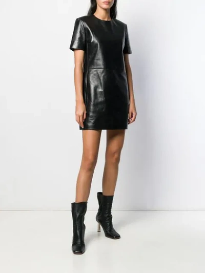 Shop Saint Laurent Leather T-shirt Dress In Black
