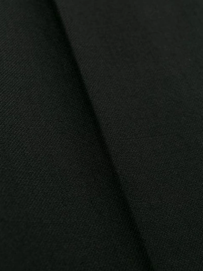 Shop Courrèges High Rise Logo Waistband Trousers In Black