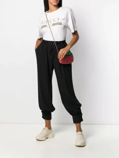 Shop Gucci Cuffed Drawstring Trousers In Black