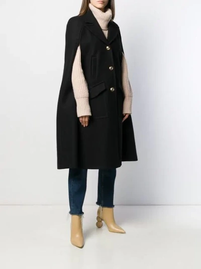 SLEEVELESS BUTTON-FRONT COAT