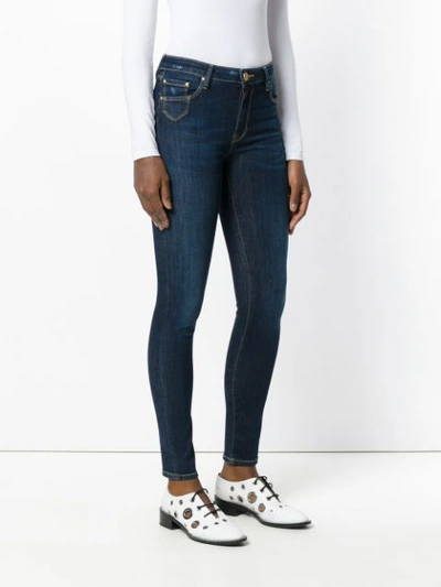 Shop Don't Cry Skinny Jeans - Blue