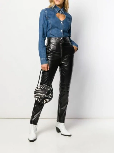 Shop Msgm Leather Look Trousers In Black