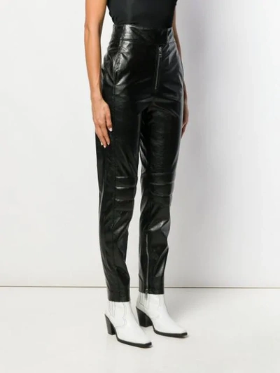 Shop Msgm Leather Look Trousers In Black