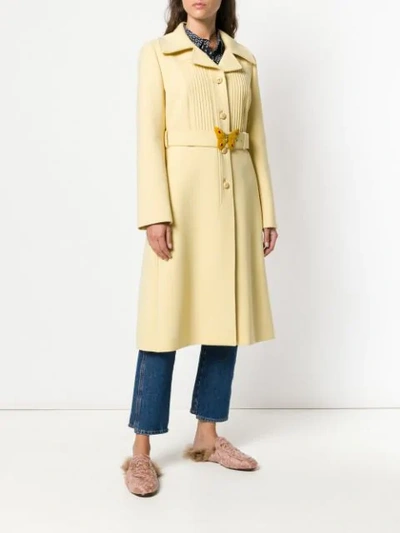Shop Gucci Butterfly Buckle Notch Collar Coat In Yellow