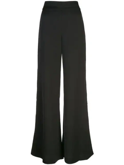 Shop Alexis Roque Trousers In Black