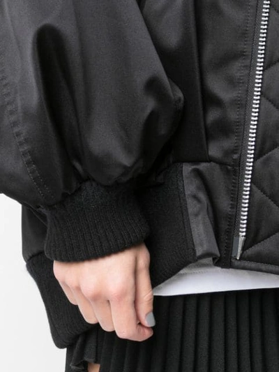 Shop Undercover Oversized Bomber Jacket In Black