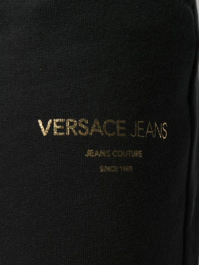 Shop Versace Jeans Logo Track Pants In Black