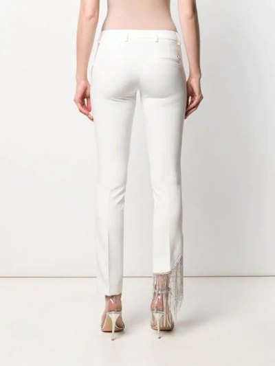 Shop Philipp Plein Crystal Fringe Trousers In White