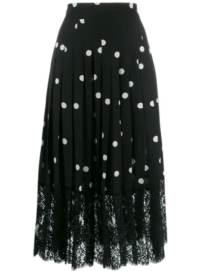 Shop Dolce & Gabbana Polka Dot Midi Skirt In Black