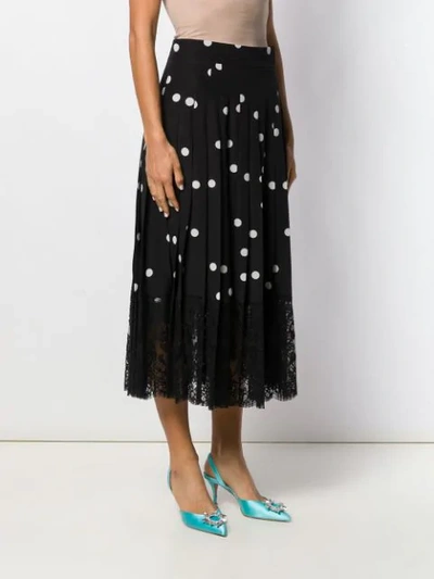 Shop Dolce & Gabbana Polka Dot Midi Skirt In Black