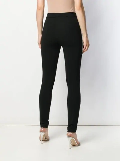 Shop Emilio Pucci Slim-fit Trousers In Black