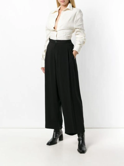 Shop Yohji Yamamoto High Waisted Loose Trousers - Black