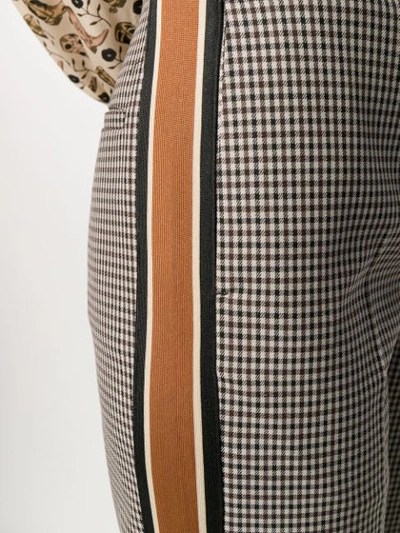 Shop Sandro Checked Trousers In Brown