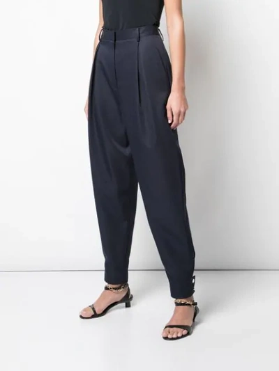 Shop Tibi Techy Twill Pleated Trousers In Blue