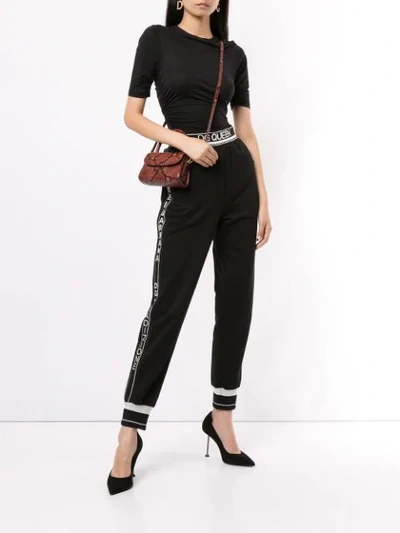 Shop Dolce & Gabbana Dg Queen Track Pants In Black