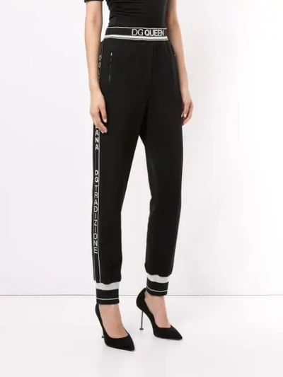 Shop Dolce & Gabbana Dg Queen Track Pants In Black