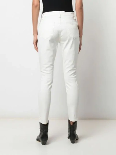 Shop Frame Le High Skinny Coated Jeans In White