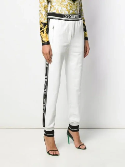 Shop Dolce & Gabbana Logo Tape Track Pants In White