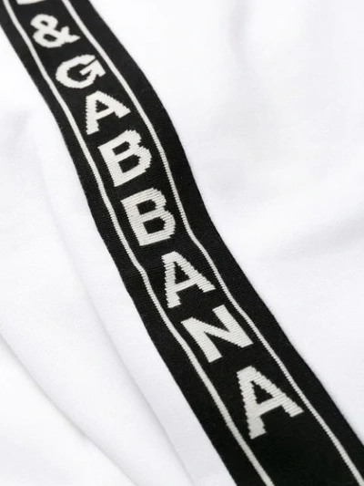 Shop Dolce & Gabbana Logo Tape Track Pants In White