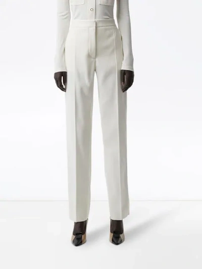 Shop Burberry Satin Stripe Detail Wool Tailored Trousers In White