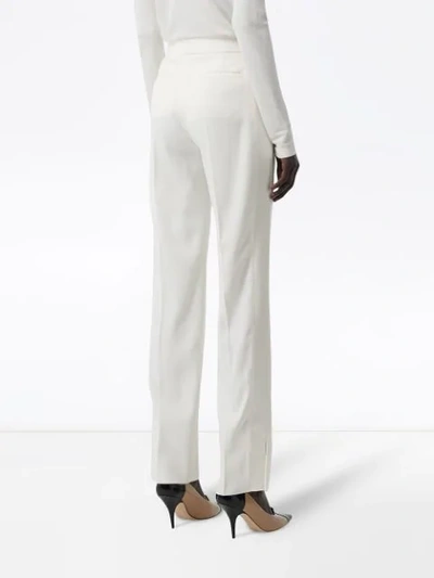 Shop Burberry Satin Stripe Detail Wool Tailored Trousers In White