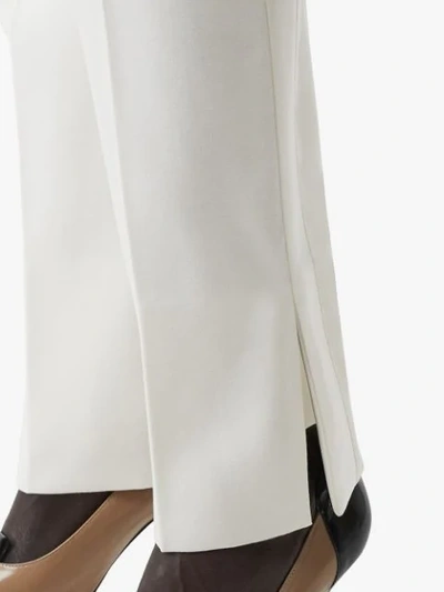 Shop Burberry Satin Stripe Detail Wool Tailored Trousers In White