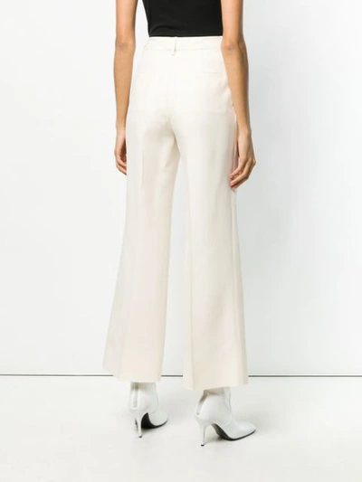 Shop Valentino Flared Tailored Trousers In White