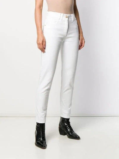 Shop Balmain Cropped Slim Fit Jeans In White