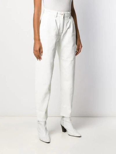 Shop Alanui High-waist Tapered Jeans In White