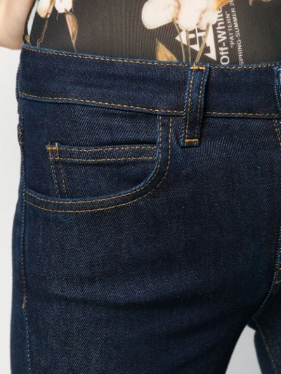 Shop L'autre Chose Flared Low-rise Jeans In U799 Dark Blue