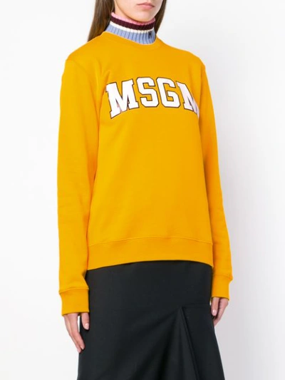 Shop Msgm Logo Printed Sweatshirt - Yellow