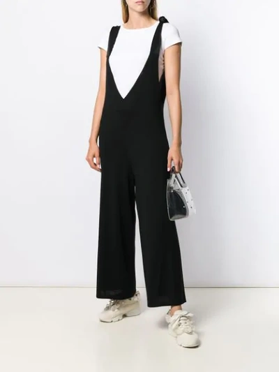 Shop Red Valentino Plunge V-neck Jumpsuit In Black