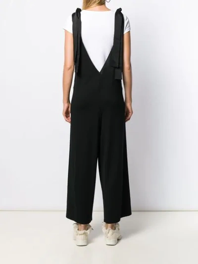 Shop Red Valentino Plunge V-neck Jumpsuit In Black